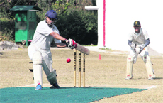A batsman in action during a match in the Salahuddin Memorial Cricket Tournament in Dehradun on Tuesday. 
