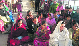 Members of Mazdoor Sangh air their problems before the authorities in Mussoorie on Tuesday.