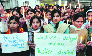 Students of Government College for Women, Gurgaon, take out a candlelight march in protest against the Delhi gang rape on Tuesday. 
