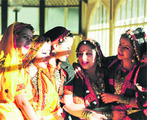 Girls busy gossiping prior to their performance at Gaiety Theatre in Shimla.