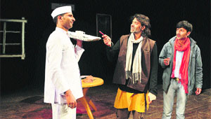 Artistes enact a scene from the play, Coffee House, directed by Rupesh Bhimta at Gaiety Theatre in Shimla recently.