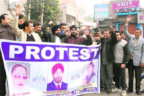 Members of the Socialistic Democratic Party protest against traffic chaos in Jammu on Tuesday