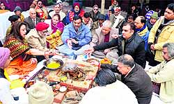 Members of the Harivallabh Sangeet Sammelan hold a yajna on the first day of the Harivallabh Sangeet Pratiyogita in Jalandhar on Tuesday