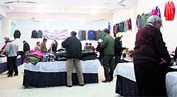 An art exhibition; and (below) a winter garment sale at Virsa Vihar in Jalandhar