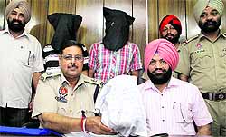 Some drug smugglers from whom heroin was seized in 2012 in police custody in Jalandhar