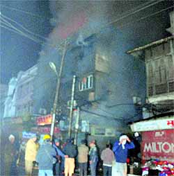 Smoke billows out from a showroom in Ambala Cantonment after a fire broke out on Wednesday
