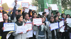 Members of Sambal, a voluntary social organisation, hold a protest against the Delhi gang-rape incident at Gandhi Park in Dehradun on Wednesday.