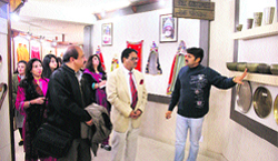 A Pakistan delegation is shown Haryanavi handicrafts at Dharohar Museum in Kurukshetra on Wednesday. Tribune photo