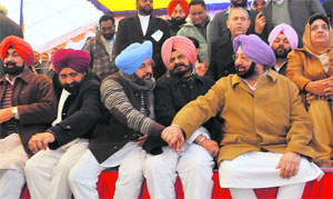 PCC chief Amarinder Singh (right) with party leaders at Fatehgarh Sahib on Wednesday. 