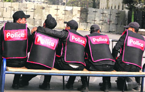 Riot policemen outside the upper house of Parliament in Cairo on Wednesday. 