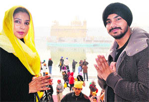 Pop Singer Daler Mehandis son actor Gurdeep Mehandi along with his mother actress Nikki Mehandi prays for the success of his upcoming movie Meri Shaadi Karao at the Golden Temple on Wednesday.