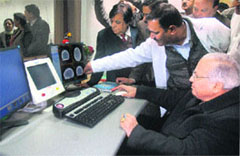 Punjab Health and Family Welfare Minister Madan Mohan Mittal inaugurates the CT scan machine at the Civil Hospital in Jalandhar on Thursday