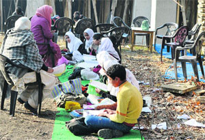 Students of Government High School Barzulla study in the open as repeated reminders by the school authorities to carry out repairs of the dilapidated building have fallen on deaf ears.