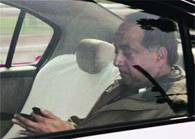 Police Commissioner Neeraj Kumar leaves after appearing before a parliamentary panel
