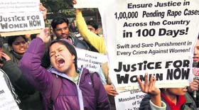 Demonstrators shout slogans during a protest in New Delhi on Thursday