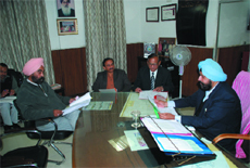 The meeting of the finance and contract committee of the Municipal Corporation, Bathinda, in progress at the Mayors office on Friday.