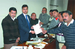 Members of the Balmiki Samaj and the Safai Sewak Union present their charters of demands to the chairperson of the Nationa Safai Karamchari Commission, Hari Ram Sood (third from left), in Bathinda on Friday. 