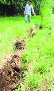 Wide cracks appeared on land at Nada village near Panchkula.