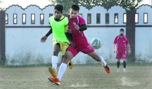 Players in action in the 7th Abhishek Dabral Memorial Football Tournament in Dehradun on Friday. 