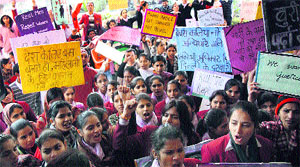 College students protest against the Delhi gang rape case in Gurgaon on Friday.