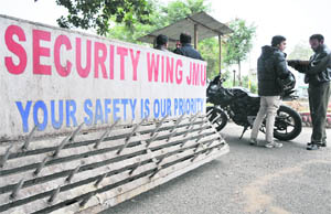 The police has put barricades at the main entrance of the MA stadium in Jammu. 