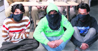 The accused in police custody in Amritsar on Saturday. Photo: Sameer Sehgal 