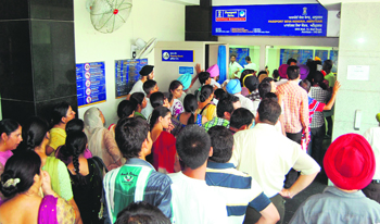 Automation in public services has helped a great deal, but the pressure of large numbers remains a challenge in India.