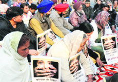 Residents hold a condolence meeting for the Delhi rape victim in Karnal on Saturday.