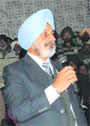 Former DGP PS Gill adresses his supporters at a meeting in Moga on Saturday. 