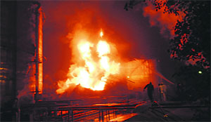 Firemen trying to douse the flames at the Ropar Thermal Plant on Saturday.