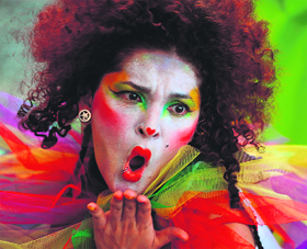A reveller dances during the "Carnaval de Cali Viejo" parade, on Friday in Cali, Colombia. AFP