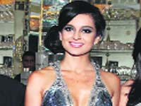 Kangana goes places: Kangana was at the launch of Tods Signature Collection at Paris and  then seen at Hepburns LBD and pearl look