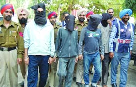 Four members of a gang of looters landed in the police custody in Amritsar