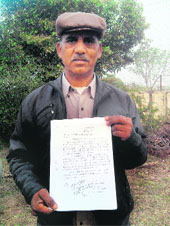 Ram Kumar Bohatra shows a copy of his complaint in Panchkula on Sunday.