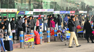A huge rush of passengers at the Chandigarh airport on Sunday. 
