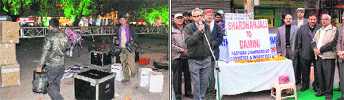 Workers pack up equipment after a cultural function was cancelled by the UT Administration at Sector 17, Chandigarh, on Sunday. tribune photo: vicky gharu (left) Traders pay tributes at Sector 7, Panchkula, on Sunday. 