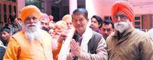 Union Minister for Water Resources Harish Rawat along with Shri Panchayati Nirmala Akhada saints at a function in Haridwar. 