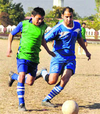 Players in action during a match in the 7th Abhishek Dabral Memorial Football Tournament in Dehradun on Sunday.