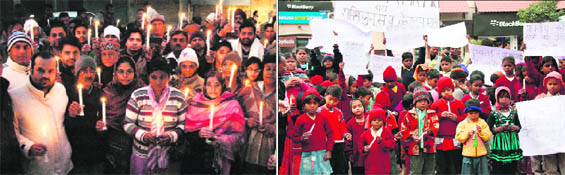(Left) Activists of the BJP and HJC take out a candlelight march in Ambala after the death of the victim on Sunday; (right) schoolchildren light candles in Gurgaon.