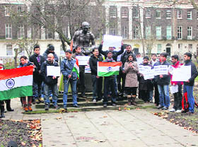 Volunteers of the Pravasi Bharat protest against the Delhi gang-rape incident in London on Sunday.
