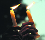 Activists take part in a candlelight vigil in Kolkata on Sunday.