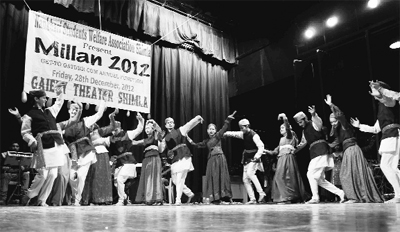 Students perform a folk dance during a cultural function organised by the Nankhari Student Welfare Association at the Gaiety Theatre in Shimla.