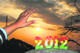 The last sunset of 2012 as seen in Dharamsala on Monday. 