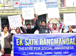 Activists of 'Ek Sath Rangmandal' pay tributes to the Delhi gang-rape victim outside the Press Club in Jammu on Monday.