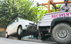 A recovery van tows away a wrongly parked car in Ludhiana. A file photo 