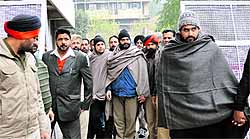 Sunny Johar (centre) and two other accused in attack on AIG Mand being produced in the Ludhiana court on Monday