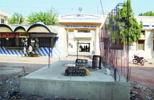 A pillar being raised opposite the entrance of Pingalwara House in Amritsar. 