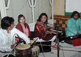 A qawwali programme in progress at a hotel and a group of youngsters enjoys at a party hosted at another hotel in the city