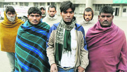 Relatives of the deceased at the GMCH, Sector 32, in Chandigarh. A tribune photograph