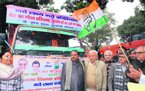 Chief Minister Bhupinder Singh Hooda flags off the Haryana Vikas Sandesh rath yatra in Chandigarh on Tuesday.